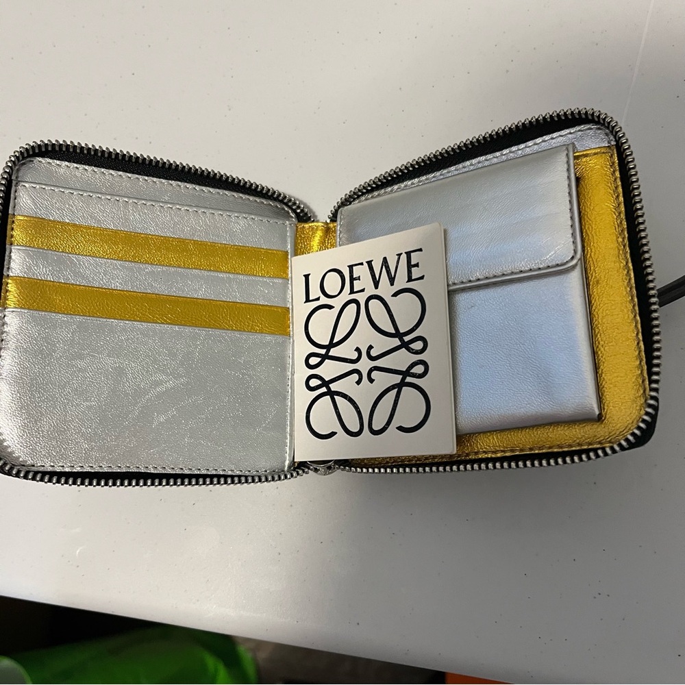 Loewe men’s black metallic square zip wallet.